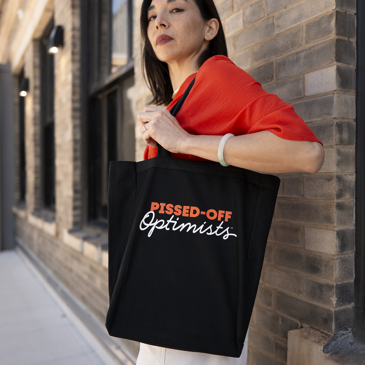 "Pissed-Off Optimists" Tote Bag